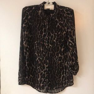 GUESS Los Angeles Animal print semi sheer blouse.
